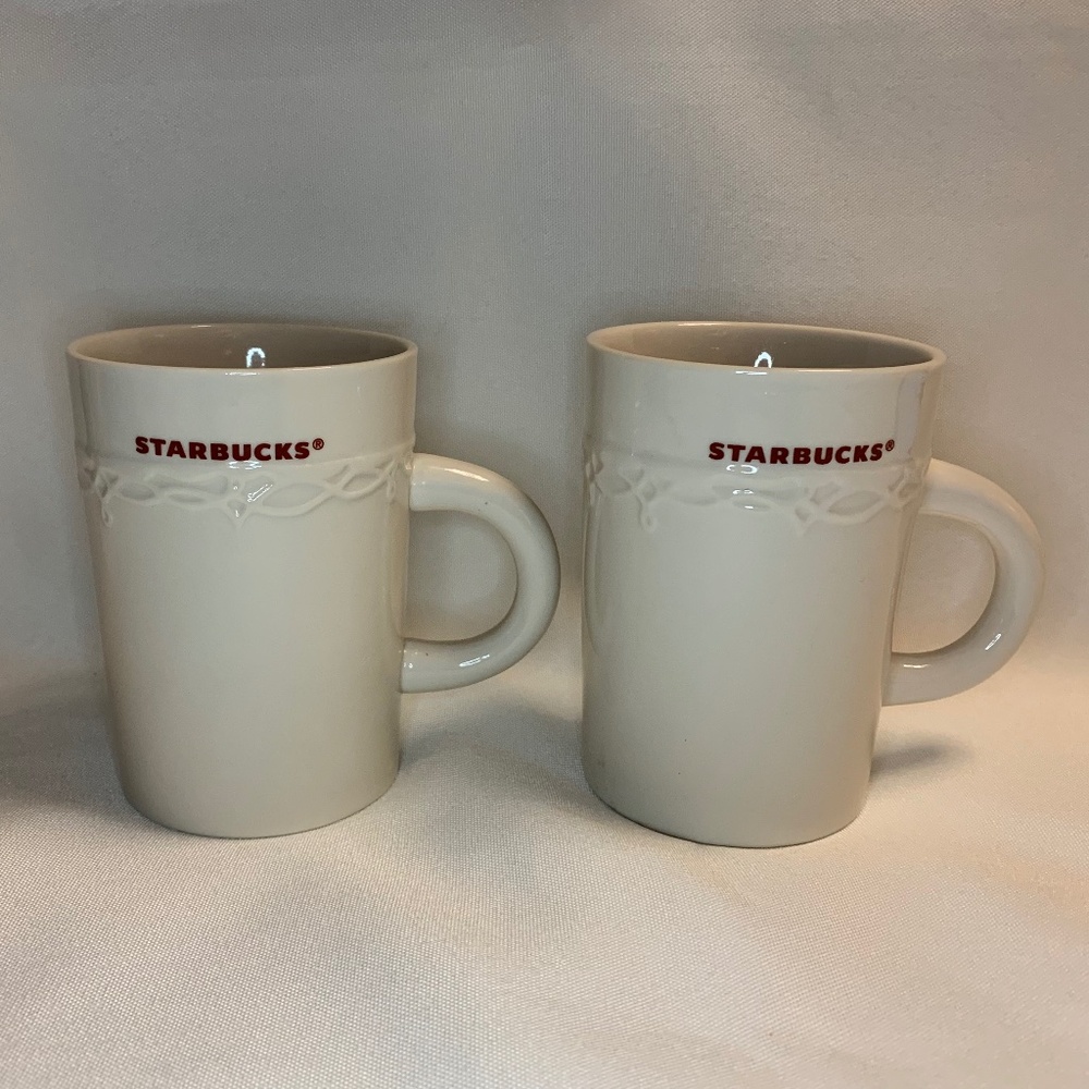 EUC! Starbucks Set of 2 White Ceramic Mugs with Embossed Motif!